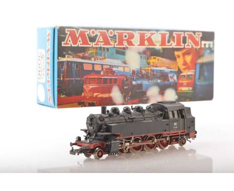 A boxed Marklin HO Gauge 3-rail German (DB) 2-8-2 Tank Locomotive,  ref 3096, in standard livery as No. 86 173 with auto-unco