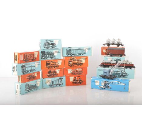 Boxed Vintage Marklin HO Gauge 3-rail German Freight Stock (17),  in orange boxes: 315/4G car transporter (with all 4 cars), 