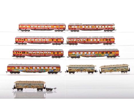Seven Rivarossi unboxed American HO Gauge Royal American Shows red and orange coaches and three Pocher Barnum's Advertising O