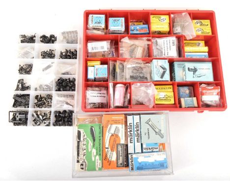 A large box of Marklin HO Gauge 3-rail Spare Parts and small Accessories including various (new) current pick-up shoes, spare
