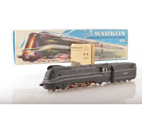 A boxed vintage Marklin HO Gauge 3-rail German (DR) Streamlined 4-6-2 Locomotive and Tender,  ref 3089, in standard livery as