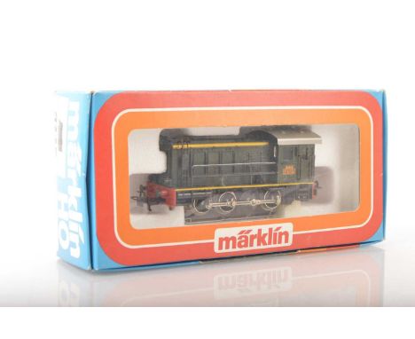 A vintage Marklin HO Gauge 3-rail French (SNCF) Diesel shunting Locomotive,  ref 3145, a 0-6-0 in SNCF green livery with yell