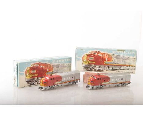 A boxed pair of vintage Marklin HO Gauge 3-rail American Santa Fe F7 Diesel Locomotives,  comprising powered Bo-Bo 337 (Markl