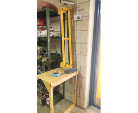 A JCB 4 legged roller bench and a router with bench