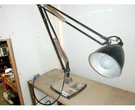 A 30's angle poise lamp with weighted base