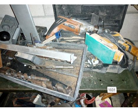 A cased Worx hammer drill and orbital sander and a lot of drill bits etc