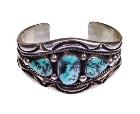 Orville Tsinnie Sterling Silver and Turquoise Cuff Bracelet  Navajo-made cuff having geometric and spherical motif with (3) t