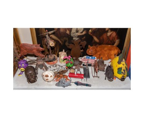 Metal Pig Assortment  (22) items including wind chimes, a weather vane, watering cans, a clock and figurines / sculptures  Pr
