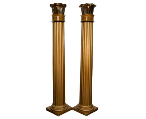 Greek Style Architectural Columns  Pair of fluted wood columns having gold-tone and black lacquer finish; made up of glued bl