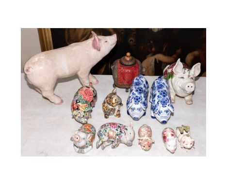 Ceramic Pig Assortment  (12) items including various motifs, sizes and colors in sitting, standing and lying down positions  