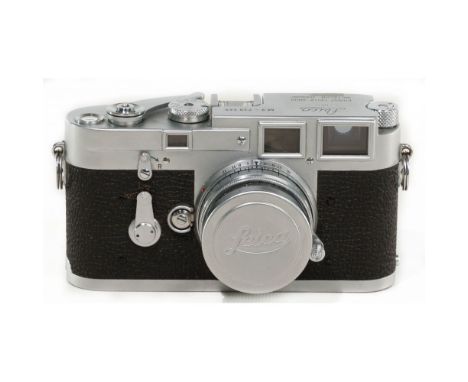 Leica DBP M3 35mm Camera  Serial #M3-739349, manufactured in Germany having lens covers, corduroy lined leather case and stra