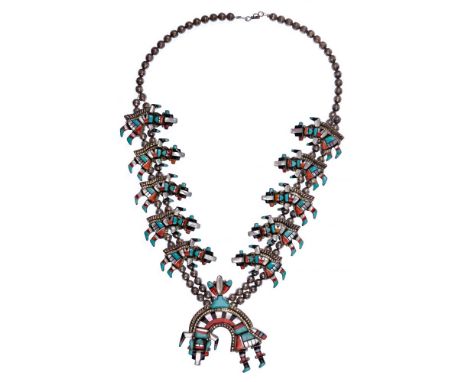 Benson Yazzie Sterling Silver Kokopella Necklace  Double strand beaded necklace having (11) kokopella figures with coral, tur