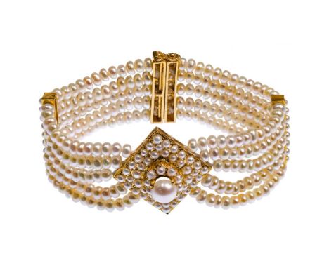 22k Yellow Gold and Pearl Bracelet  5-strand pearl bracelet having a centralized pearl flanked by pearls; marked '22k' on bac