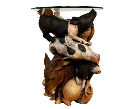 Jef Raasch (American, 20th Century) Pig Side Table  1978, signed on back of lower pig, glass top having a pile of pigs as the