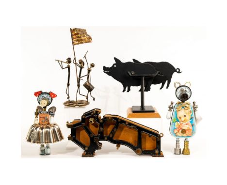 Steampunk Pig Assortment  (4) items including a patinated steel kinetic pig sculpture signed on base 'Robert Ringer 1990'; (2
