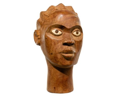 African Carved Wood Bust  20th century, possibly Bakongo, depicting a head having cornrows and inlaid bone eyes  Property fro