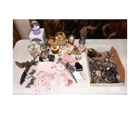 Pig Motif Assortment  Over (50) items including miniatures, snow globes and wind chimes; in various colors, styles and sizes 