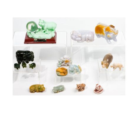 Pig Figurine Assortment  Approximately (15) items, including some carved from stone  Property from: a Chicago, Illinois (Gold