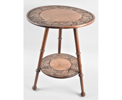 An Edwardian Circular Two Tier Tripod Table with Carved Bordered Top and Stretcher Shelf, 38.5cms Diameter 
