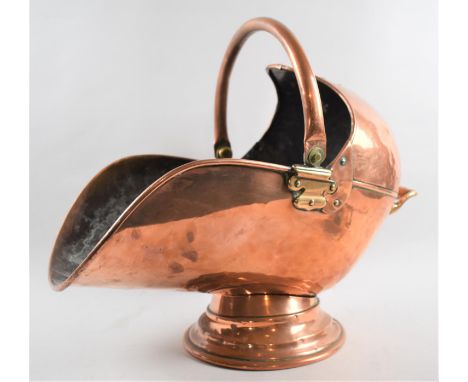 A Vintage Brass Mounted Copper Helmet Shaped Coal Scuttle with Loop Handle, 48cms Long 