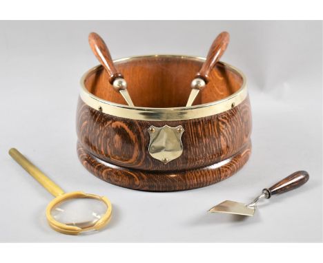 An Edwardian Silver Plate Mounted Oak Bowl with Matching Salad Servers, A Silver Plate Bladed Miniature Trowel and a Magnifyi