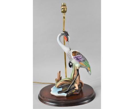 A Modern Resin Table Lamp in the Form of a Bird Preening, Oval Plinth Base, 51ms High Overall 