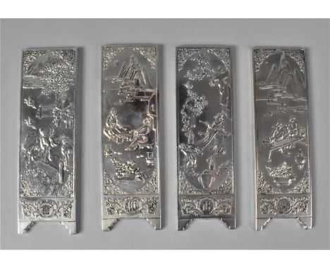 A Collection of Four Chinese Silver Plate on Copper Ingots/Scroll Weights Decorated in Relief with Various Tradesmen, 14.5x4.