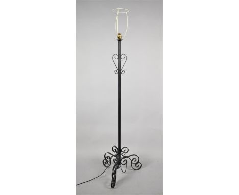 A Modern Wrought Iron Tripod Standard Lamp 