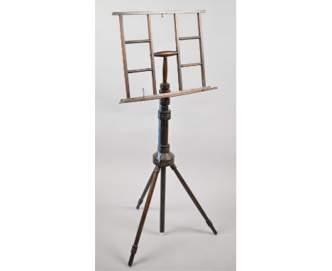 A Continental Turned Wooden Music Stand on Tripod Supports 
