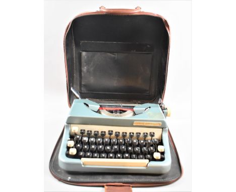 A Vintage Leather Cased Portable Manual Typewriter 