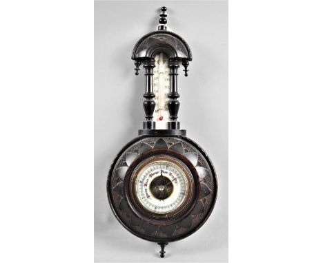 An Edwardian Wheel Barometer with Thermometer, 40cms High 