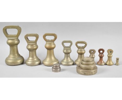 A Collection of Nine Various Brass Bell Weights and a Set of Kitchen Scale Weights 