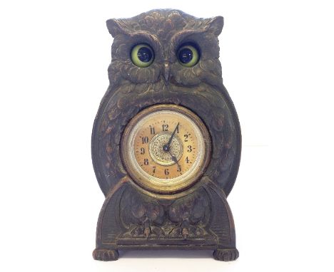 An early 20th century Arts & Crafts copper and wood cased mantle clock modelled as an Owl with automaton eyes (eyes appear no