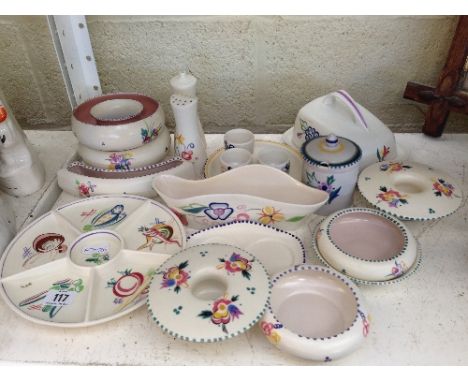 A collection of white bodied Poole Pottery items.