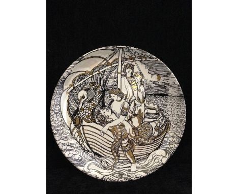A Poole Pottery Trial plate, decorated in the Camelot pattern, attributed to Tony Morris in black and gold on white ground, t