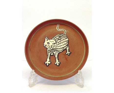 A Poole Pottery Atlantis period dish by Guy Sydenham, decorated in relief with an image of a Cat, impressed marks to reverse 