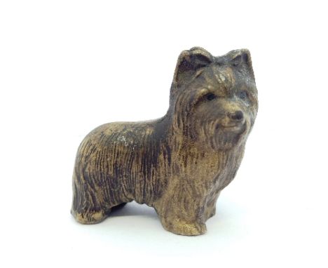 A Poole Pottery stoneware model of a Yorshire Terrier after a design by Bert Baggeley produced in the 1980's by Nicky Massere