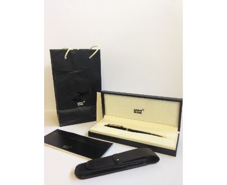 A Mont Blanc Le Grande Meisterstuck black cased ballpoint pen, authenticated with original box, service manual, leather pen c