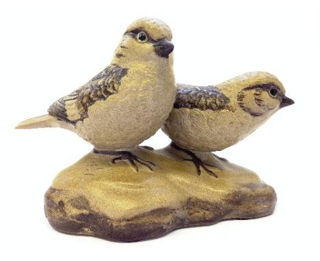 A Poole Pottery Barbara Linley Adams model of a pair of Snow Buntings, impressed marks and monogram J.S. (Janet Stone) to bas