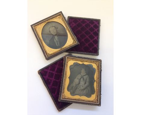 A pair of 19th century Daguerreotype style portrait photographs in original leather cases.