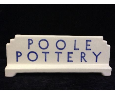 A Poole Pottery Art Deco style free standing advertising sign, inscribed in blue lettering: "Poole Pottery", ex Christies Poo
