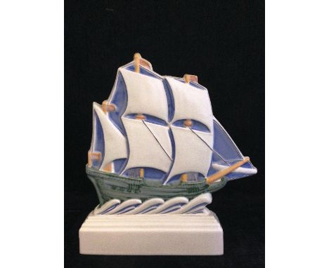 A Poole Pottery Art Deco model of a Galleon, designed by Harold Stabler, circa 1920's decorated in tones of blue, green and y