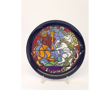 A Poole Pottery Queen's Silver Jubilee 1977 Commemorative dish, designed by Tony Morris in a numbered edition, 216, painted b