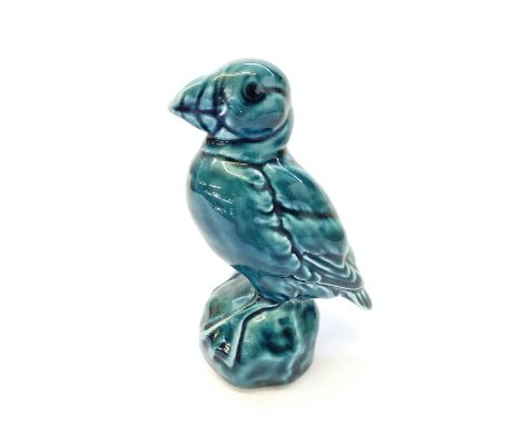 A Poole Zone blue glazed model of a Puffin recreated from the original design by Barbara Linley Adams (4 inches).