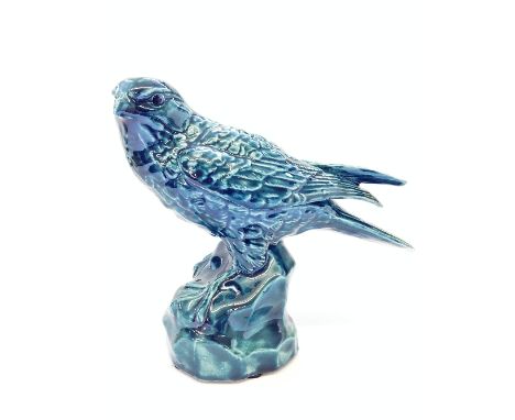 A Poole Zone blue glazed model of a Merlin, recreated from the original stoneware mould by Joe Leadbeater from a design by Ba