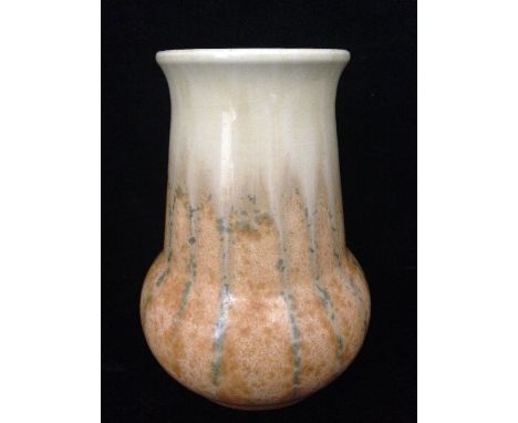 A Ruskin (William Howson Taylor) Elephant's foot Crystalline glaze vase, decorated in tones of brown and blue.