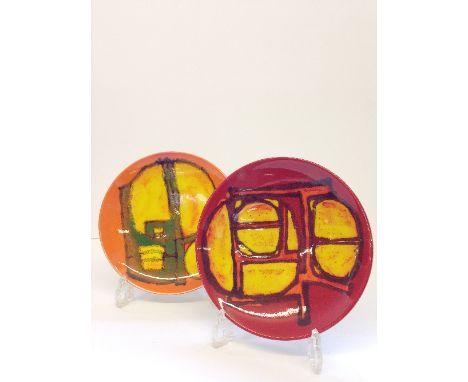 A Poole Pottery Delphis dish, shape 3, decorated by Carol Cutler in an abstract pattern on red ground together with another d