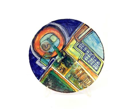 A Poole Pottery Studio bowl by Tony Morris, decorated in vivid colours in an abstract Town Plan design in tones of orange, gr