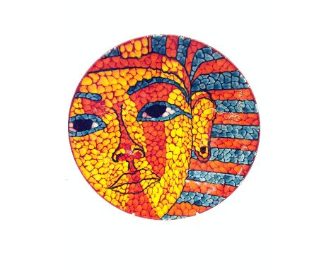A Poole Pottery Living Glaze charger, decorated in the Tutankhamun head design by Nikki Massarella, 1/1.