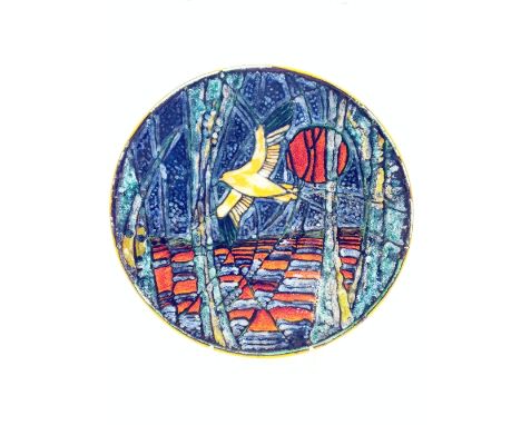 A Poole Pottery Living Glaze charger by Tony Morris, decorated with a flying bird and sun in abstract landscape in tones of o
